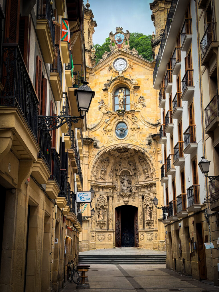 Historic street view in San Sebastián with traditional architecture during a road trip through Europe.
